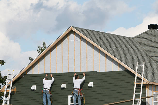 Professional Siding Replacement technician working in Greensburg, IN